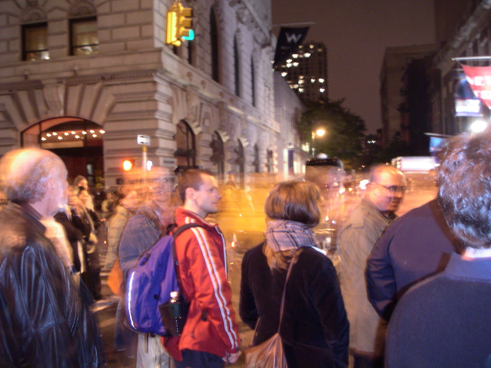 crowds watch the departure